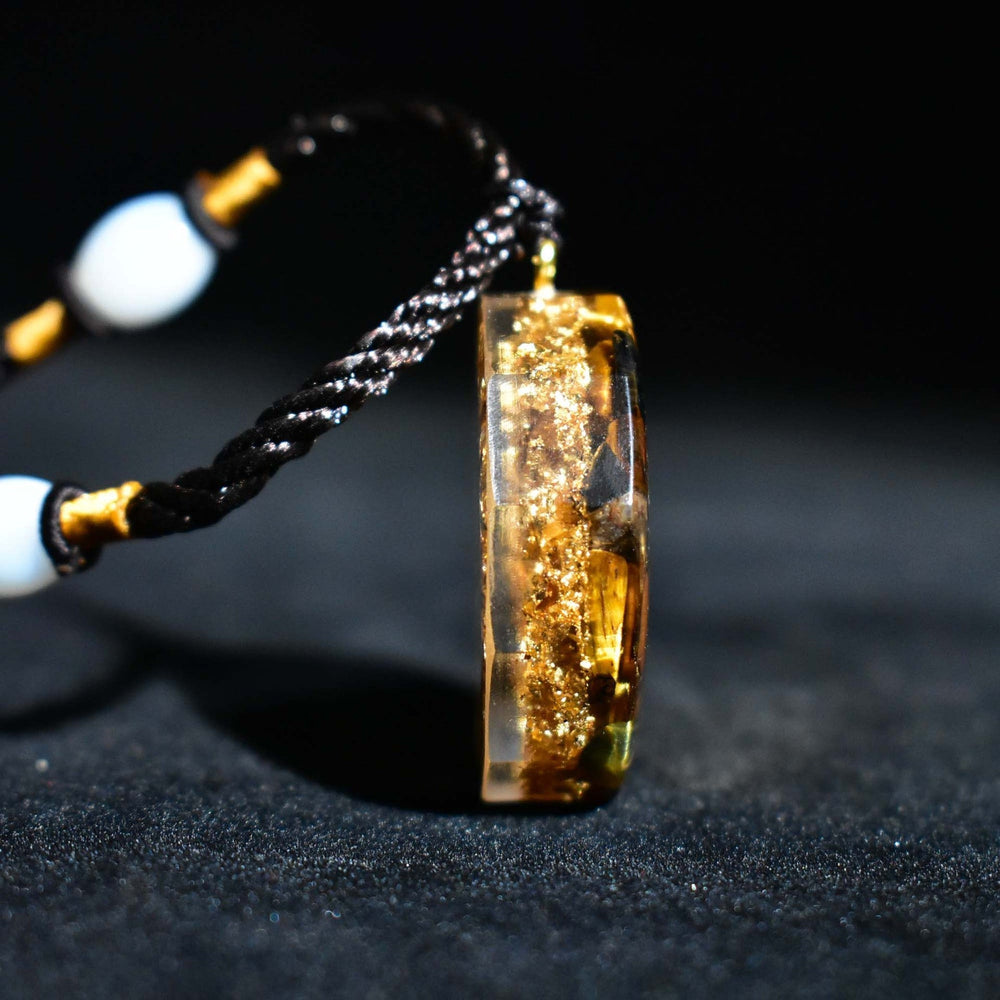 Collier en orgonite Sri Yantra sacré - Œil de Tigre - Karma et Moi